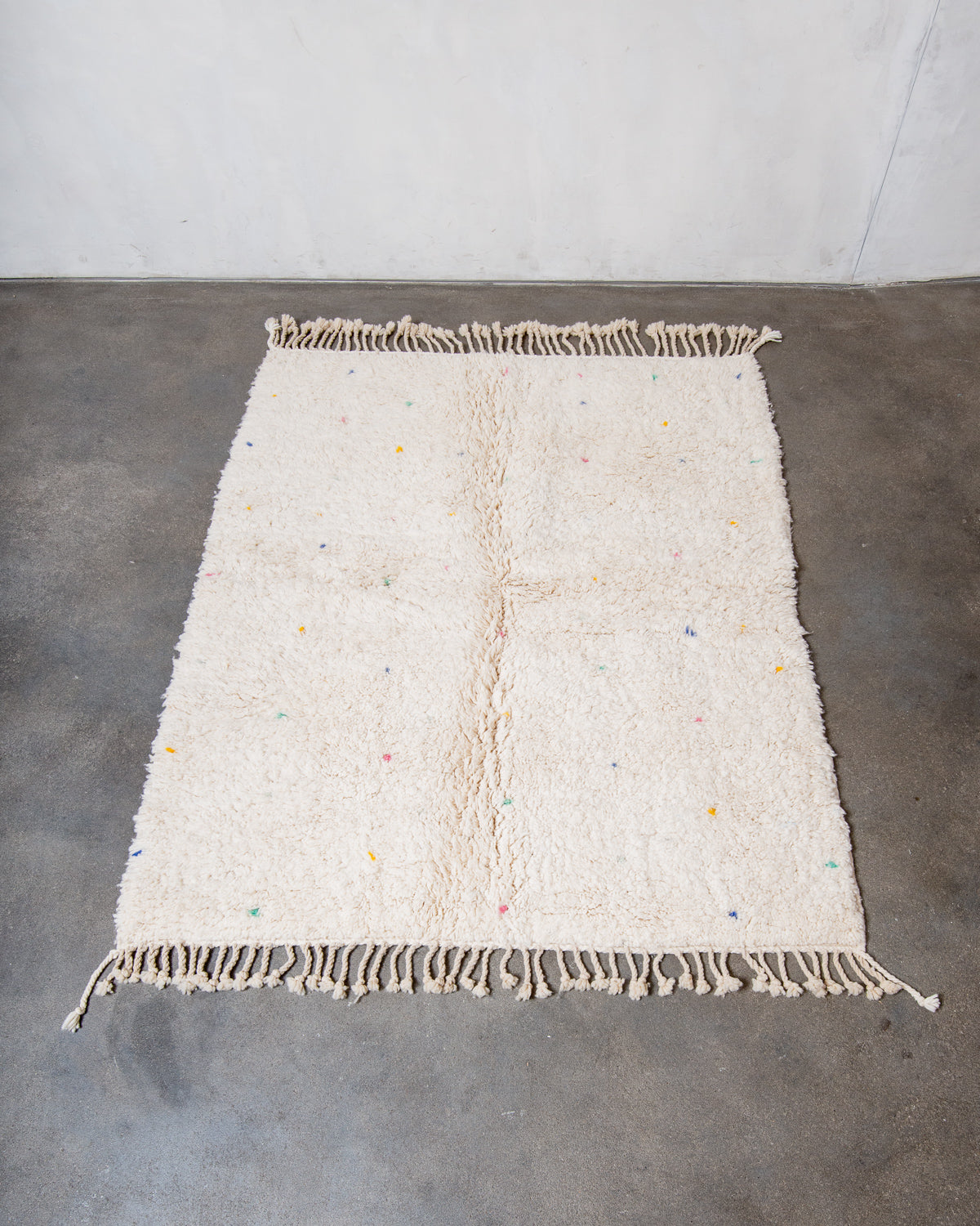 Modern, designer, handcrafted Berber rug from Morocco. Beniourain carpet with beautiful colours and patterns and fluffy wool texture.
